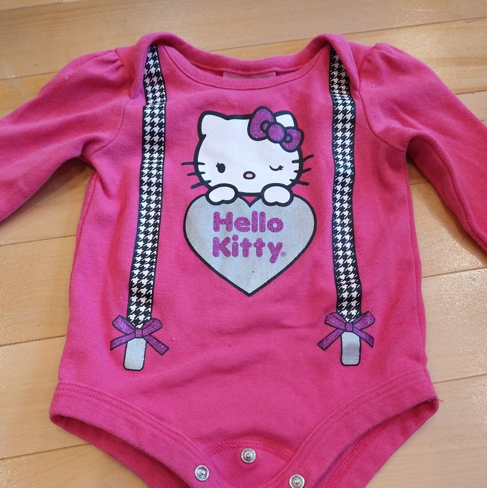 4/20$ 3-6m hello Kitty San Rio long sleeve pink onesie with suspenders
